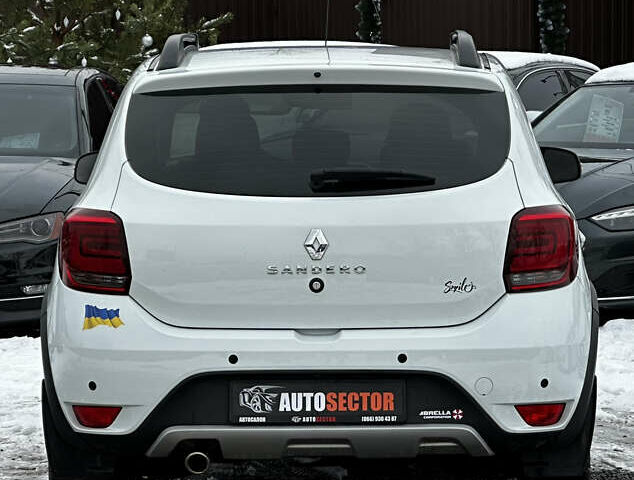 Білий Рено Сандеро, об'ємом двигуна 1.46 л та пробігом 92 тис. км за 13300 $, фото 8 на Automoto.ua
