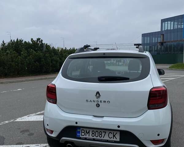 Белый Рено Сандеро, объемом двигателя 1.46 л и пробегом 58 тыс. км за 13300 $, фото 3 на Automoto.ua