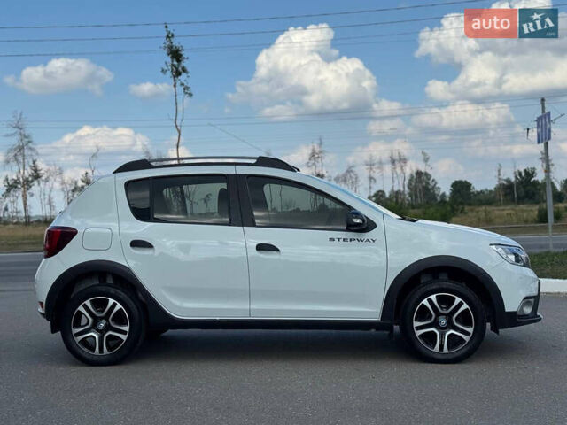 Білий Рено Сандеро, об'ємом двигуна 0.9 л та пробігом 50 тис. км за 11600 $, фото 9 на Automoto.ua
