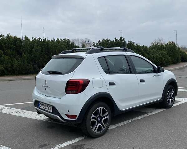 Белый Рено Сандеро, объемом двигателя 1.46 л и пробегом 58 тыс. км за 13300 $, фото 4 на Automoto.ua
