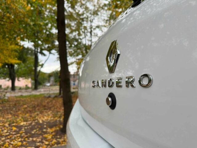 Білий Рено Сандеро, об'ємом двигуна 1 л та пробігом 99 тис. км за 7999 $, фото 12 на Automoto.ua