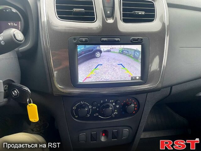 Белый Рено Сандеро, объемом двигателя 1.5 л и пробегом 37 тыс. км за 13500 $, фото 7 на Automoto.ua