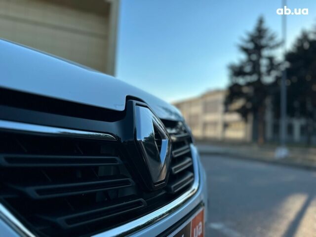 Рено Сандеро 2021 в Запорожье на Automoto.ua Белый Рено Сандеро, объемом двигателя 1 л и пробегом 98 тыс. км за 8890 $, фото 12 на Automoto.ua