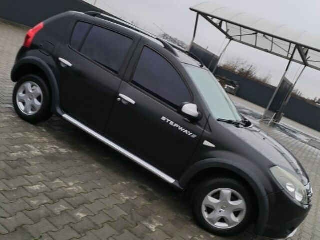 Черный Рено Сандеро, объемом двигателя 0 л и пробегом 60 тыс. км за 7299 $, фото 7 на Automoto.ua