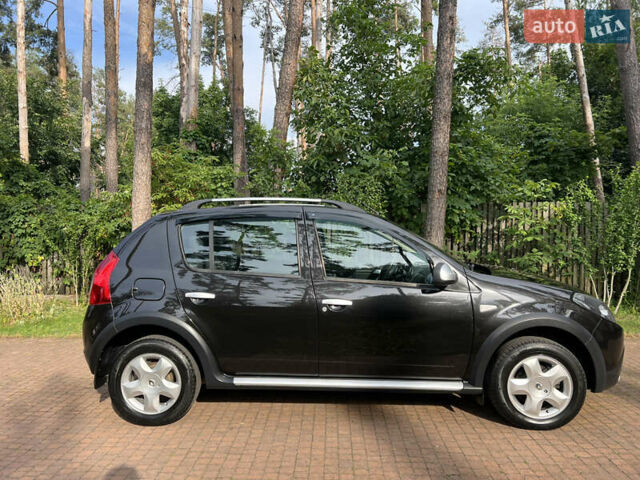 Чорний Рено Сандеро, об'ємом двигуна 1.6 л та пробігом 81 тис. км за 8700 $, фото 13 на Automoto.ua