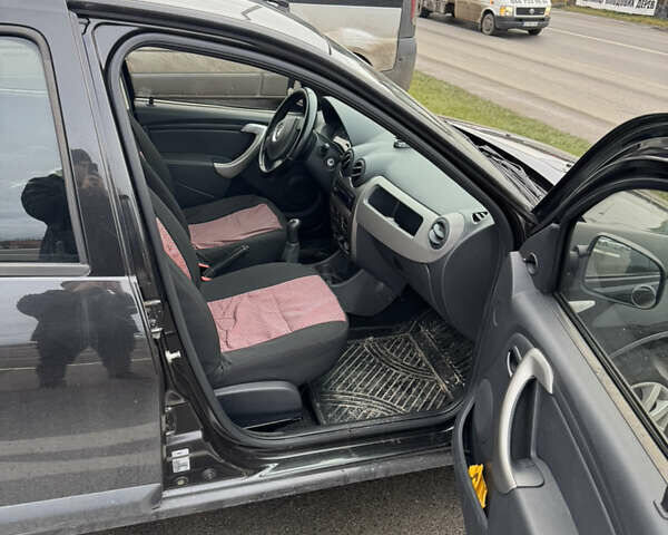 Черный Рено Сандеро, объемом двигателя 1.39 л и пробегом 112 тыс. км за 6000 $, фото 7 на Automoto.ua