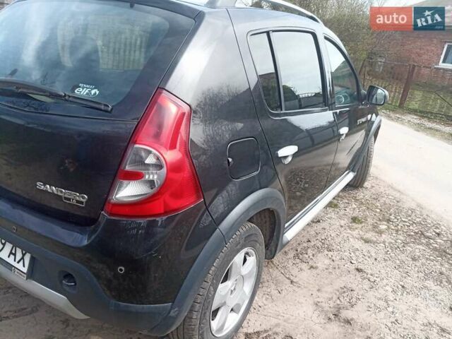 Черный Рено Сандеро, объемом двигателя 1.6 л и пробегом 222 тыс. км за 5900 $, фото 4 на Automoto.ua
