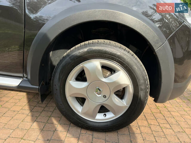 Чорний Рено Сандеро, об'ємом двигуна 1.6 л та пробігом 81 тис. км за 8700 $, фото 14 на Automoto.ua