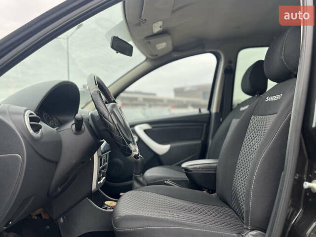 Чорний Рено Сандеро, об'ємом двигуна 1.6 л та пробігом 137 тис. км за 7200 $, фото 14 на Automoto.ua