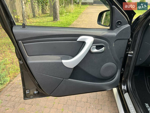 Чорний Рено Сандеро, об'ємом двигуна 1.6 л та пробігом 81 тис. км за 8700 $, фото 24 на Automoto.ua