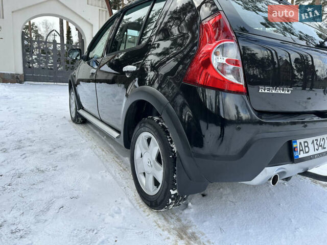 Черный Рено Сандеро, объемом двигателя 1.6 л и пробегом 79 тыс. км за 8850 $, фото 26 на Automoto.ua