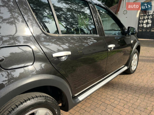 Чорний Рено Сандеро, об'ємом двигуна 1.6 л та пробігом 81 тис. км за 8700 $, фото 100 на Automoto.ua