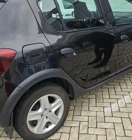 Черный Рено Сандеро, объемом двигателя 1.6 л и пробегом 160 тыс. км за 9000 $, фото 3 на Automoto.ua