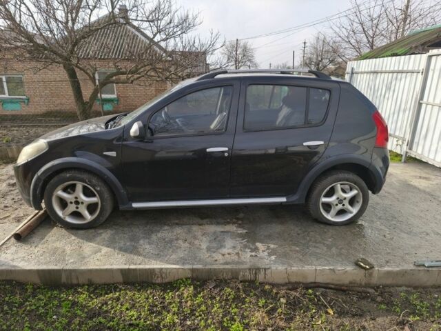 Черный Рено Сандеро, объемом двигателя 1.6 л и пробегом 197 тыс. км за 4200 $, фото 1 на Automoto.ua