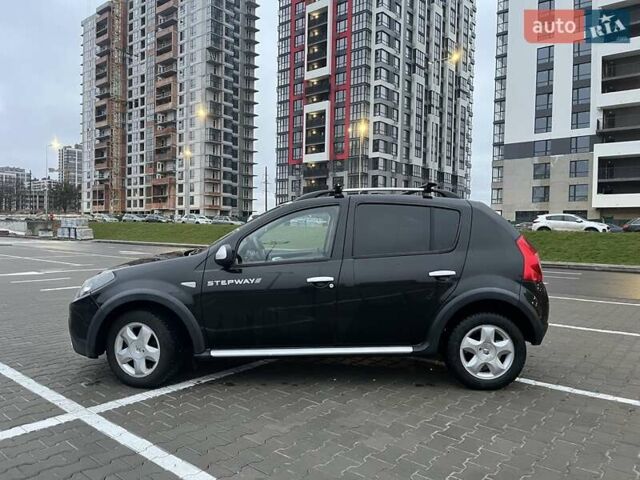 Черный Рено Сандеро, объемом двигателя 1.6 л и пробегом 132 тыс. км за 7500 $, фото 2 на Automoto.ua