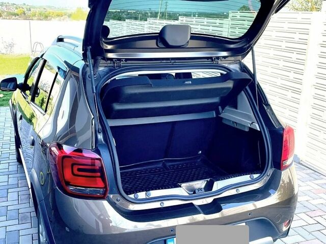 Коричневый Рено Сандеро, объемом двигателя 0.9 л и пробегом 55 тыс. км за 9390 $, фото 6 на Automoto.ua