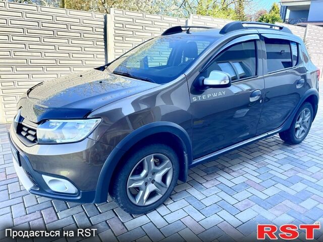 Коричневый Рено Сандеро, объемом двигателя 0.9 л и пробегом 55 тыс. км за 9390 $, фото 1 на Automoto.ua