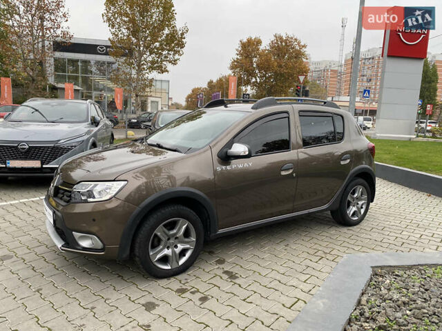 Коричневый Рено Сандеро, объемом двигателя 1.46 л и пробегом 51 тыс. км за 11800 $, фото 2 на Automoto.ua