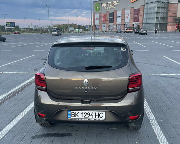 Коричневый Рено Сандеро, объемом двигателя 1 л и пробегом 105 тыс. км за 8400 $, фото 1 на Automoto.ua