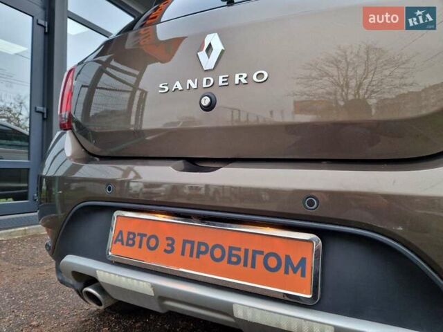 Коричневый Рено Сандеро, объемом двигателя 1.46 л и пробегом 80 тыс. км за 12000 $, фото 18 на Automoto.ua