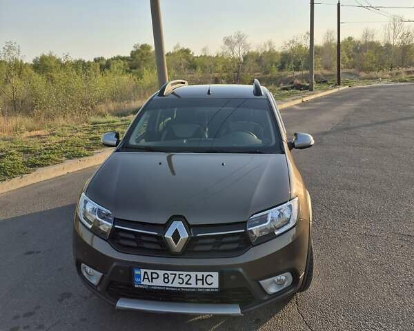 Коричневый Рено Сандеро, объемом двигателя 0.9 л и пробегом 61 тыс. км за 10900 $, фото 1 на Automoto.ua