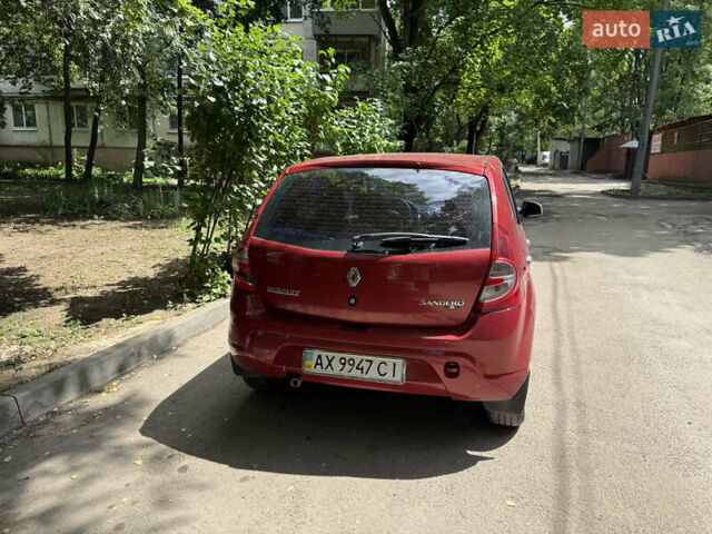 Красный Рено Сандеро, объемом двигателя 1.4 л и пробегом 150 тыс. км за 5200 $, фото 5 на Automoto.ua