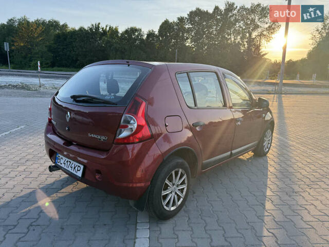 Рено Сандеро 2011 в Львове на Automoto.ua Красный Рено Сандеро, объемом двигателя 1.39 л и пробегом 252 тыс. км за 3700 $, фото 4 на Automoto.ua