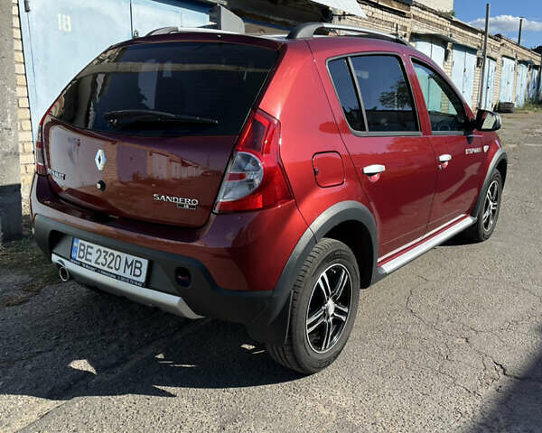 Красный Рено Сандеро, объемом двигателя 1.6 л и пробегом 113 тыс. км за 7800 $, фото 4 на Automoto.ua