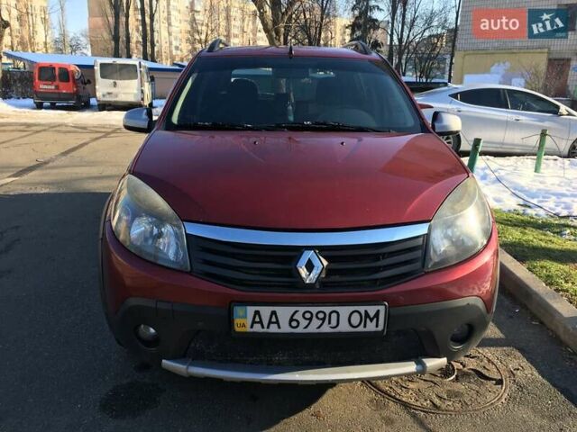 Красный Рено Сандеро, объемом двигателя 1.59 л и пробегом 251 тыс. км за 6750 $, фото 1 на Automoto.ua