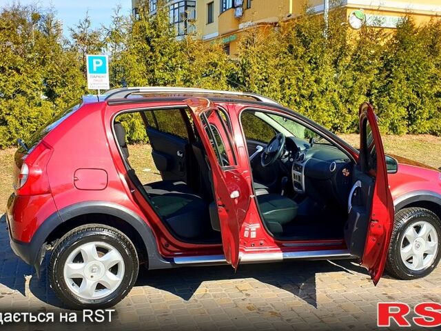Червоний Рено Сандеро, об'ємом двигуна 1.6 л та пробігом 125 тис. км за 7850 $, фото 5 на Automoto.ua