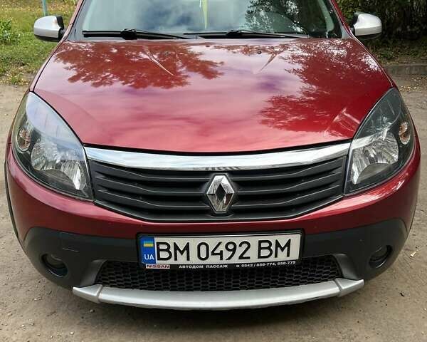 Красный Рено Сандеро, объемом двигателя 1.6 л и пробегом 96 тыс. км за 6500 $, фото 5 на Automoto.ua