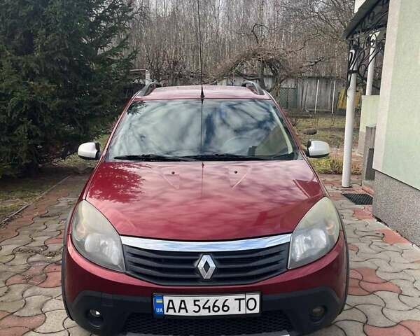 Красный Рено Сандеро, объемом двигателя 1.6 л и пробегом 163 тыс. км за 6300 $, фото 1 на Automoto.ua