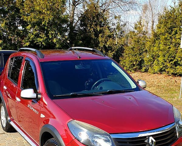 Червоний Рено Сандеро, об'ємом двигуна 1.6 л та пробігом 125 тис. км за 7850 $, фото 1 на Automoto.ua