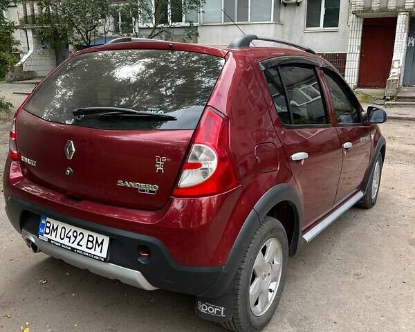 Красный Рено Сандеро, объемом двигателя 1.6 л и пробегом 96 тыс. км за 6500 $, фото 2 на Automoto.ua