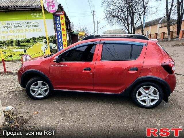 Красный Рено Сандеро, объемом двигателя 1.5 л и пробегом 143 тыс. км за 8100 $, фото 2 на Automoto.ua