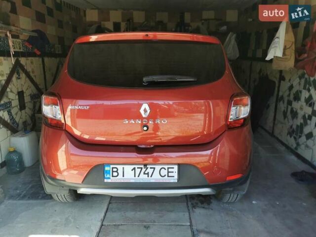 Рено Сандеро 2015 в Полтаве на Automoto.ua Красный Рено Сандеро, объемом двигателя 1.6 л и пробегом 88 тыс. км за 8500 $, фото 18 на Automoto.ua