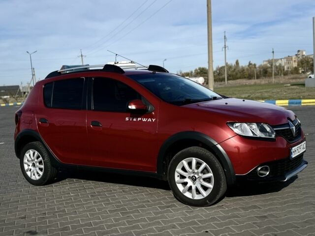 Красный Рено Сандеро, объемом двигателя 1.6 л и пробегом 84 тыс. км за 10900 $, фото 1 на Automoto.ua