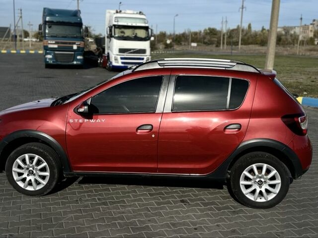 Красный Рено Сандеро, объемом двигателя 1.6 л и пробегом 84 тыс. км за 10900 $, фото 4 на Automoto.ua