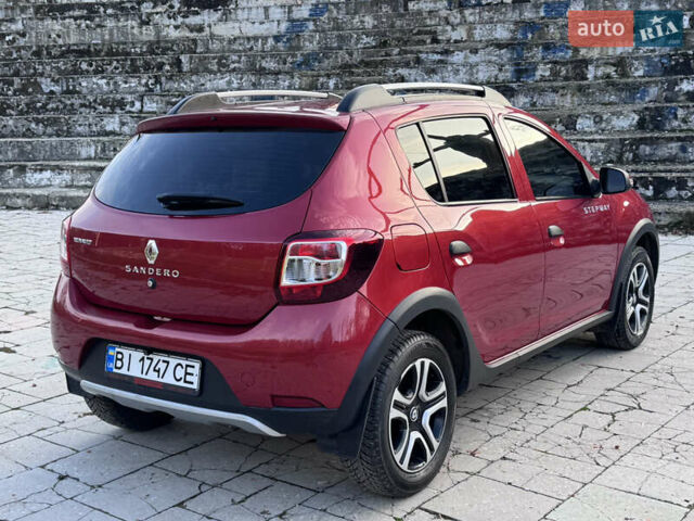 Красный Рено Сандеро, объемом двигателя 1.6 л и пробегом 88 тыс. км за 8799 $, фото 9 на Automoto.ua