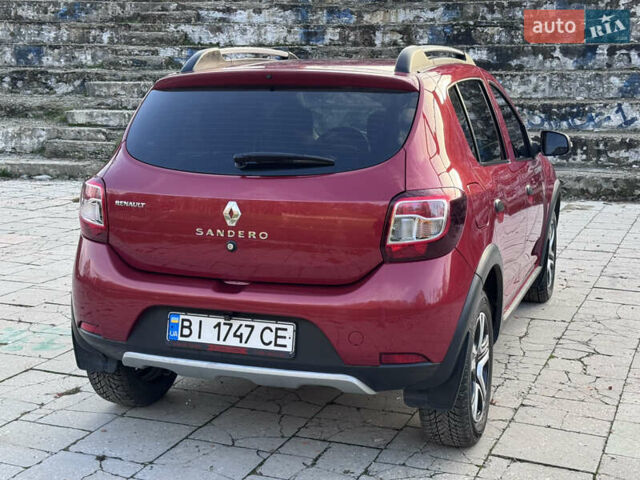 Красный Рено Сандеро, объемом двигателя 1.6 л и пробегом 88 тыс. км за 8799 $, фото 7 на Automoto.ua
