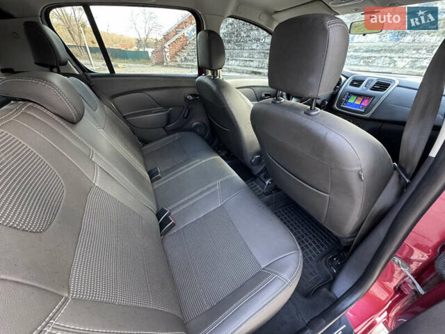 Красный Рено Сандеро, объемом двигателя 1.6 л и пробегом 88 тыс. км за 8799 $, фото 23 на Automoto.ua