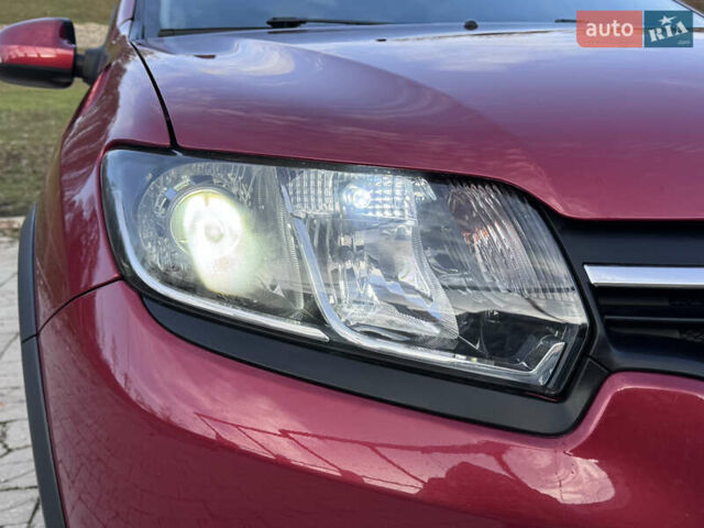 Красный Рено Сандеро, объемом двигателя 1.6 л и пробегом 88 тыс. км за 8799 $, фото 30 на Automoto.ua