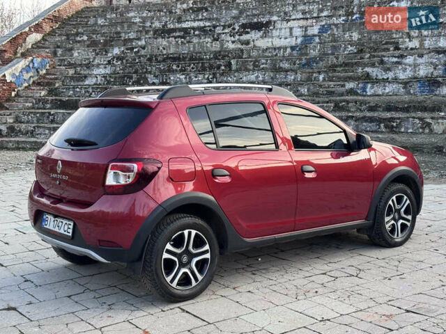 Красный Рено Сандеро, объемом двигателя 1.6 л и пробегом 88 тыс. км за 8799 $, фото 10 на Automoto.ua