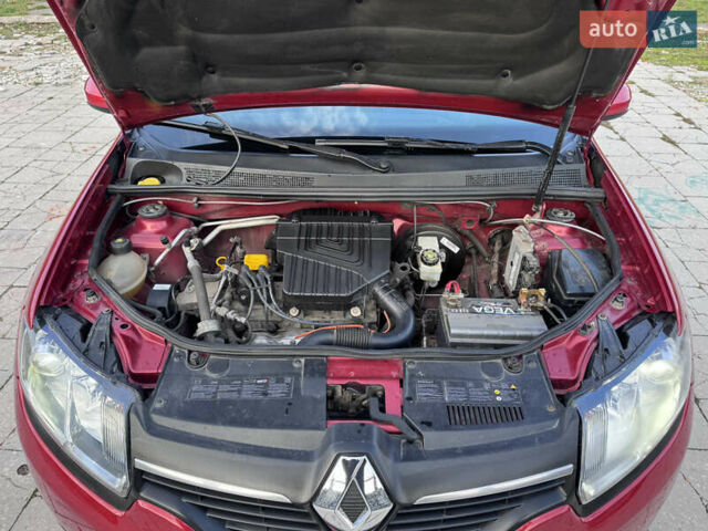 Красный Рено Сандеро, объемом двигателя 1.6 л и пробегом 88 тыс. км за 8799 $, фото 28 на Automoto.ua