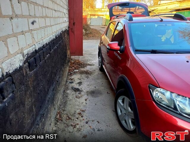 Красный Рено Сандеро, объемом двигателя 1.5 л и пробегом 146 тыс. км за 9500 $, фото 4 на Automoto.ua