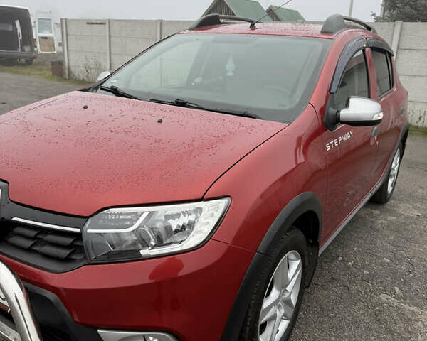 Красный Рено Сандеро, объемом двигателя 1.5 л и пробегом 94 тыс. км за 10700 $, фото 19 на Automoto.ua
