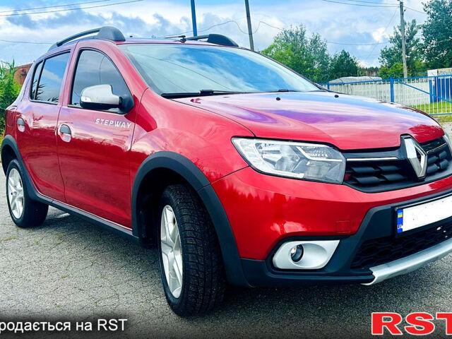 Красный Рено Сандеро, объемом двигателя 1.5 л и пробегом 125 тыс. км за 7900 $, фото 1 на Automoto.ua