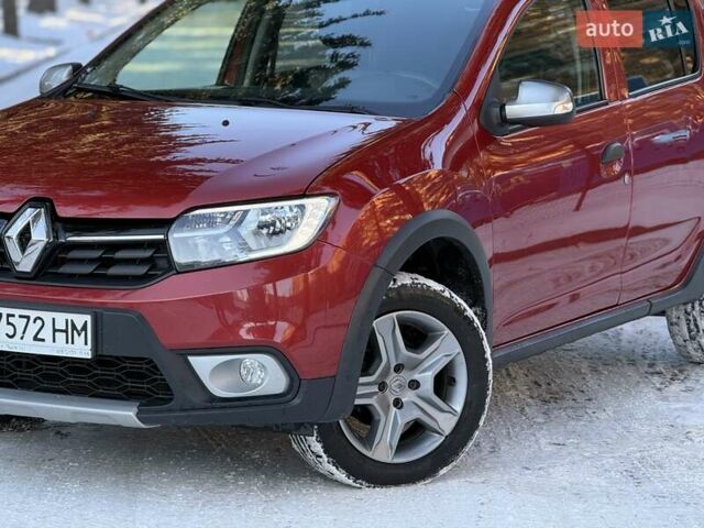 Красный Рено Сандеро, объемом двигателя 1.46 л и пробегом 55 тыс. км за 12250 $, фото 1 на Automoto.ua