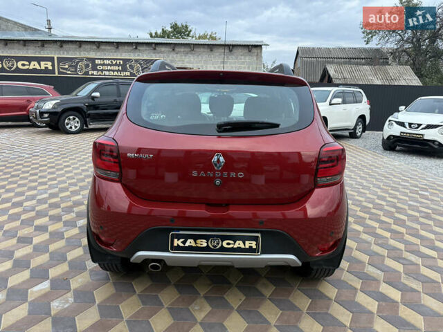 Красный Рено Сандеро, объемом двигателя 0.9 л и пробегом 59 тыс. км за 10300 $, фото 7 на Automoto.ua