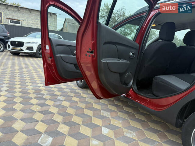 Красный Рено Сандеро, объемом двигателя 0.9 л и пробегом 59 тыс. км за 10300 $, фото 13 на Automoto.ua